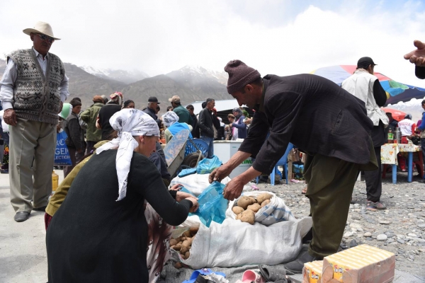 Vegetable farmers trading their produce at the Ishkashim Cross Border Market. Photo: Nance Ackerman